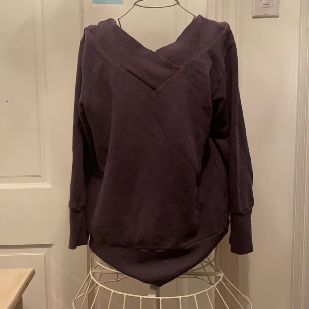 Gray sweater. V neck.